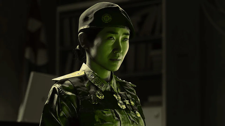 An in-game screenshot showing a Korean female soldier lit in green, with medals on her uniform.