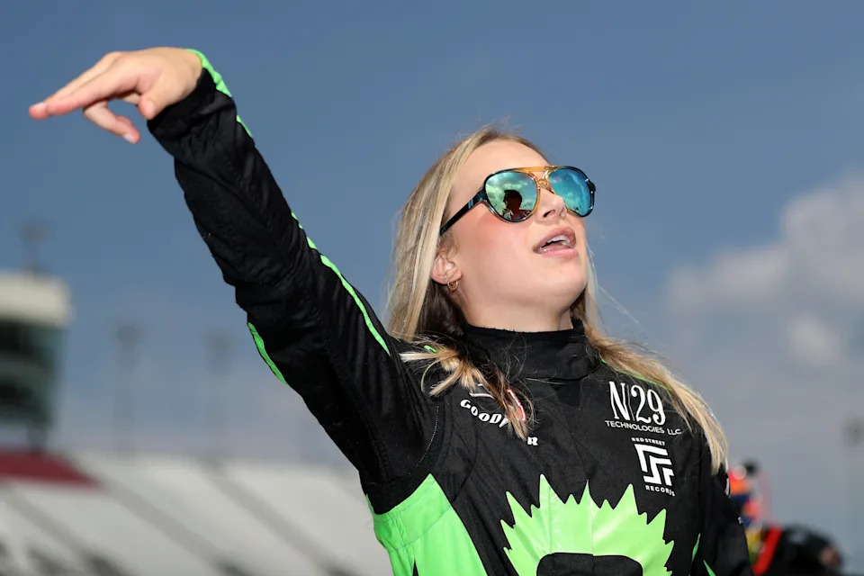 Natalie Decker, driver of the #66 Nudie's Honky Tonk Bar Toyota, works with her crew on the grid during qualifying.