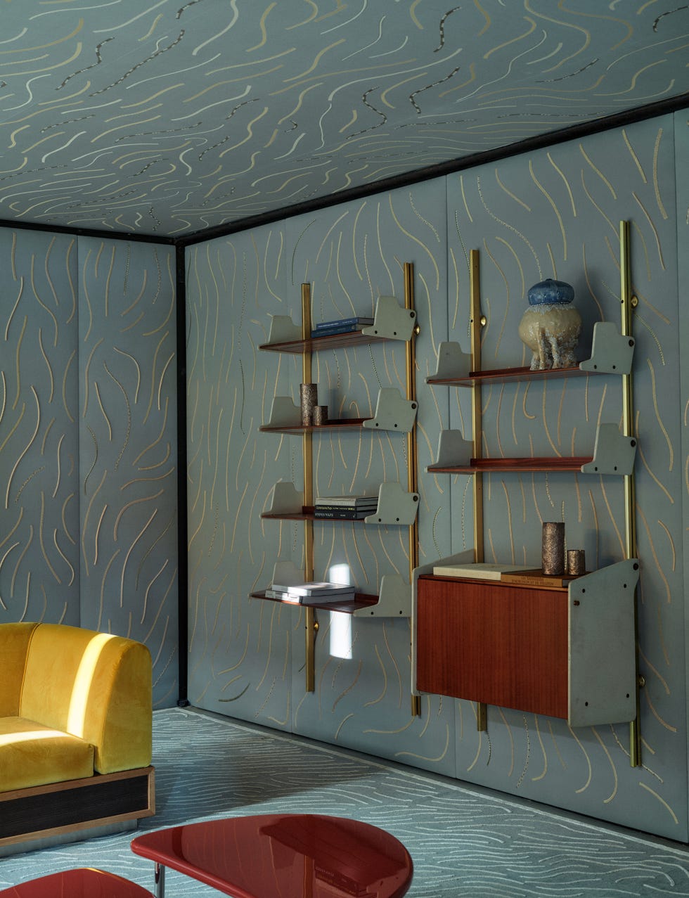Modern living space featuring shelves with decorative items.
