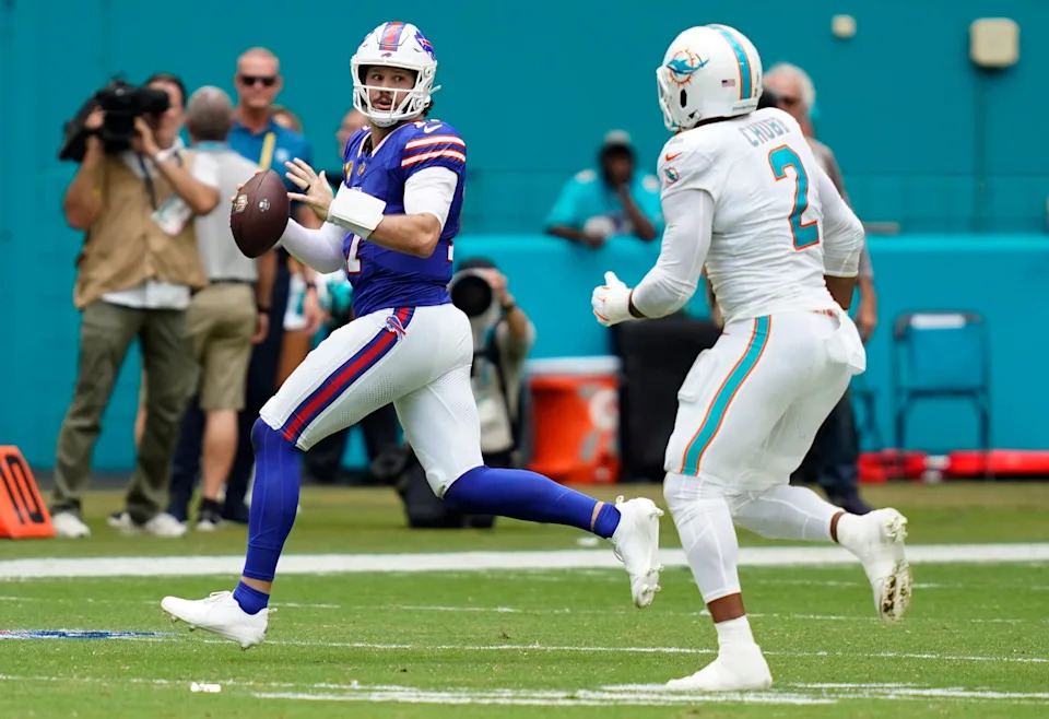Buffalo Bills quarterback Josh Allen (17) scrambles.