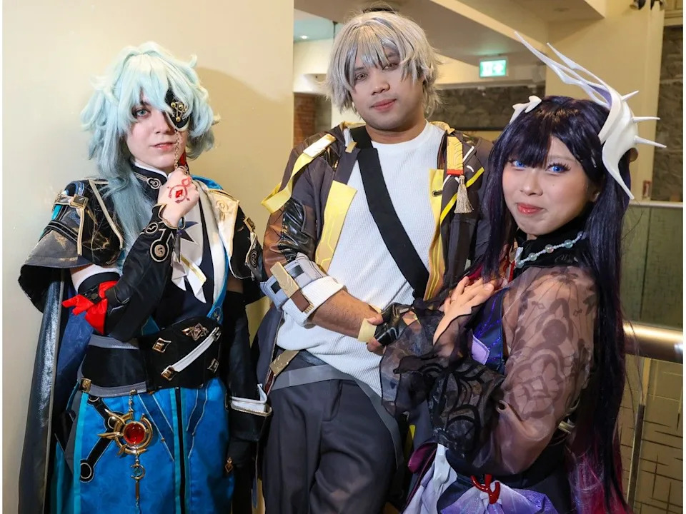 Participants are dressed as characters from Star Rail during Otafest at the Telus Convention Centre.