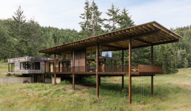 olson kundig's 'daisy ranch' is a modern log cabin with panoramic windows