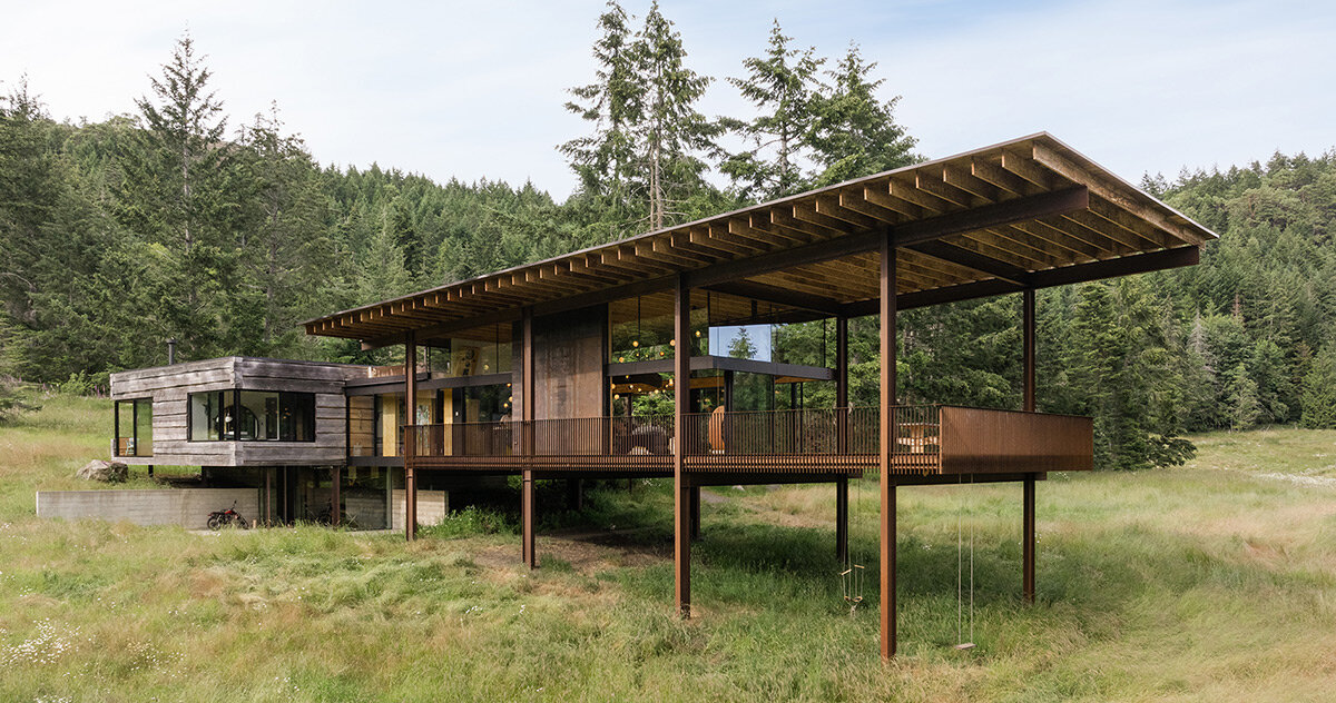 olson kundig's 'daisy ranch' is a modern log cabin with panoramic windows