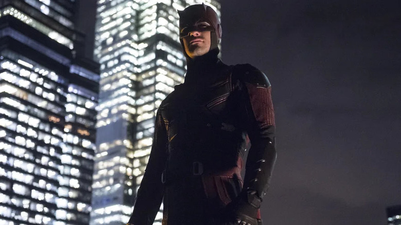 Matt Murdock stands on a Manhattan rooftop in his superhero costume