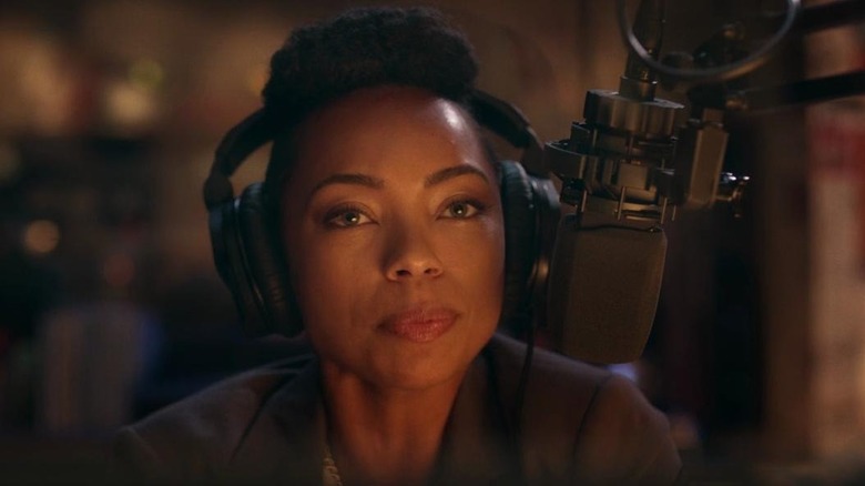 Logan Browning as Sam wearing headphones in Dear White People