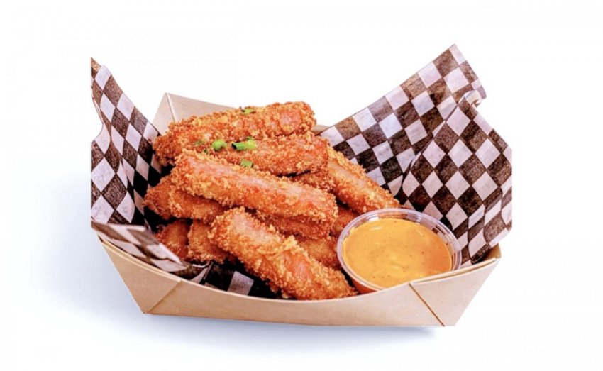 A basket of crispy, golden deep-fried Spam strips served as a salty midway snack at the Calgary Stampede.