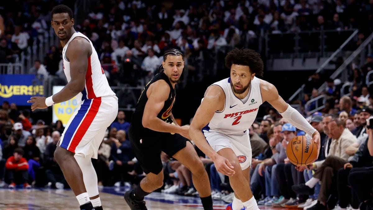 Detroit Pistons PG Cade Cunningham dribbles around a pick vs. the Cleveland Cavaliers during the 2026 NBA Playoffs at Little Caesars Arena.