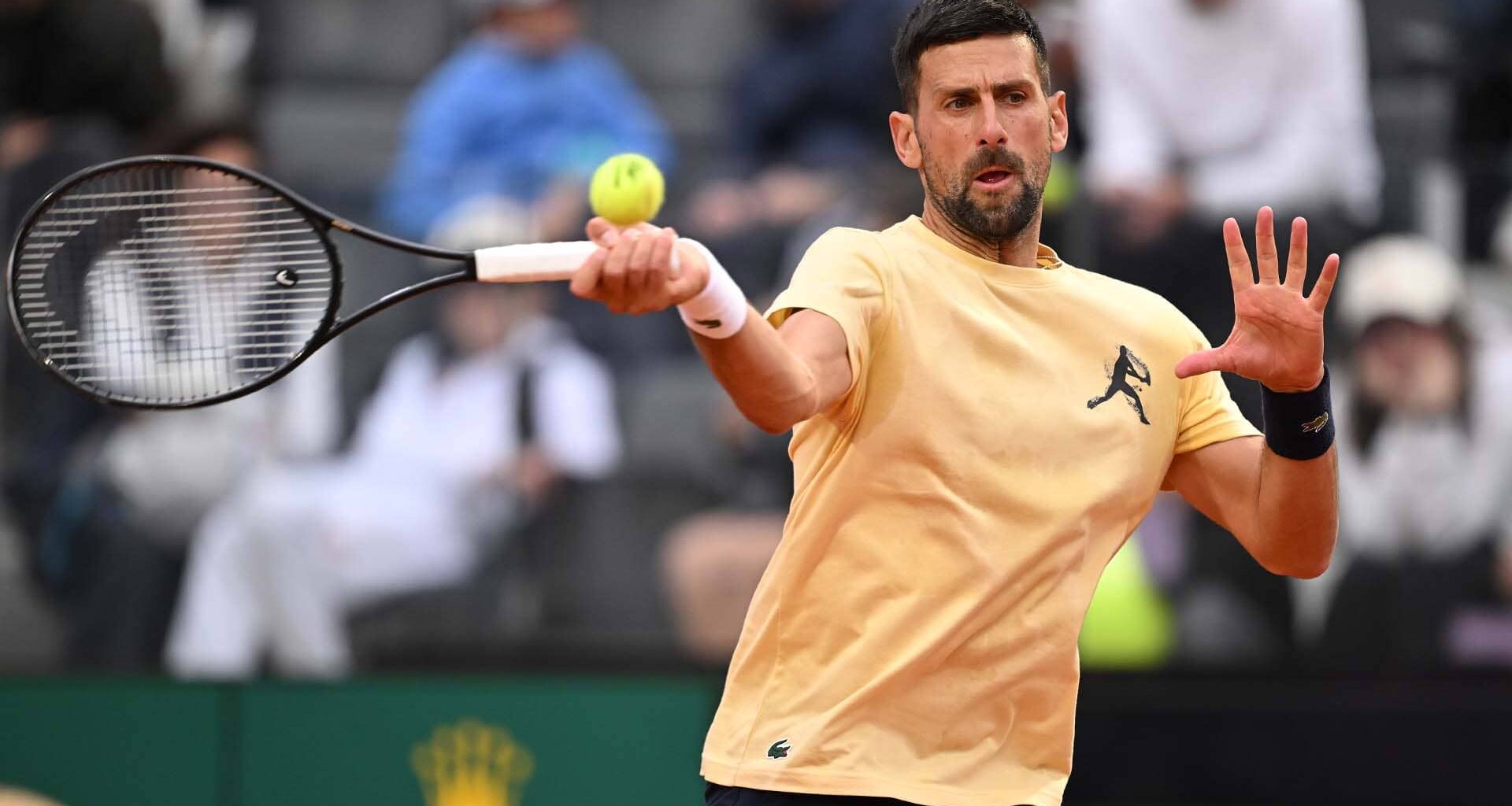 Novak Djokovic practises with Ignacio Buse on Monday at the Internazionali BNL d'Italia in Rome.