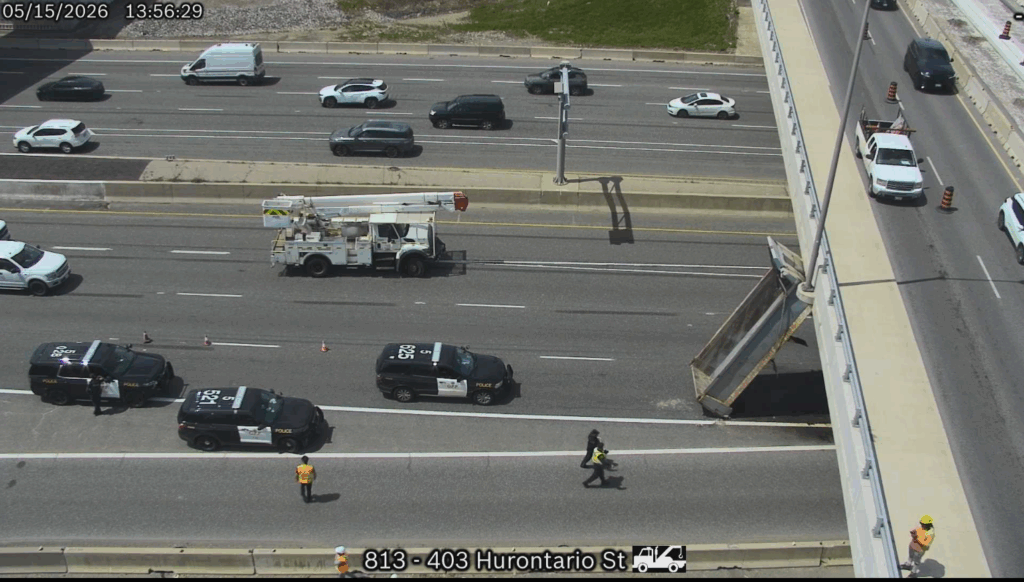 Dump truck hits overpass on Hwy. 403 in Mississauga