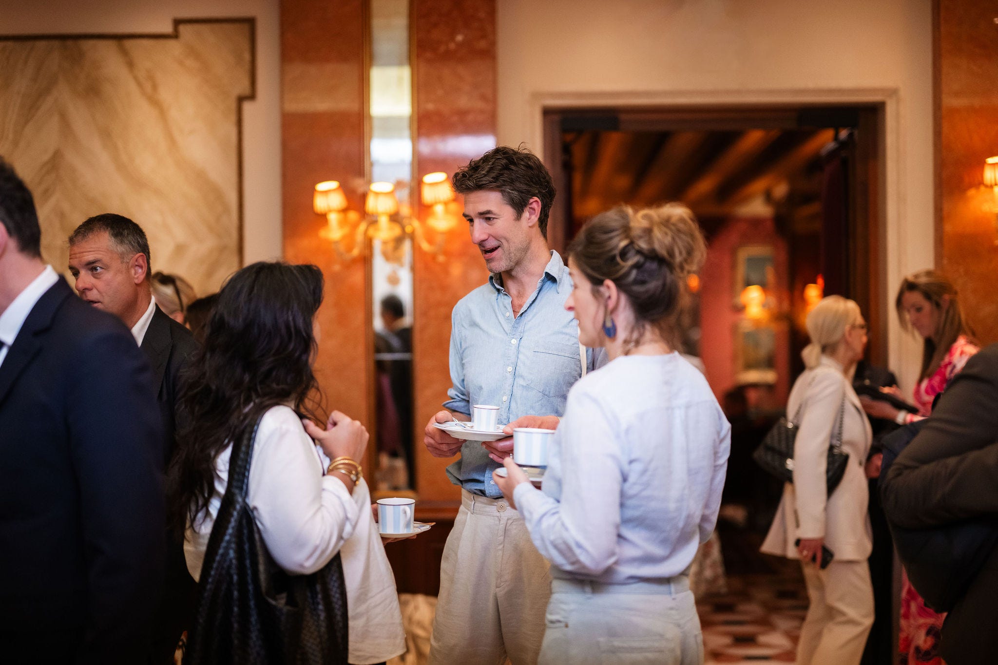 Networking event with attendees engaged in conversation