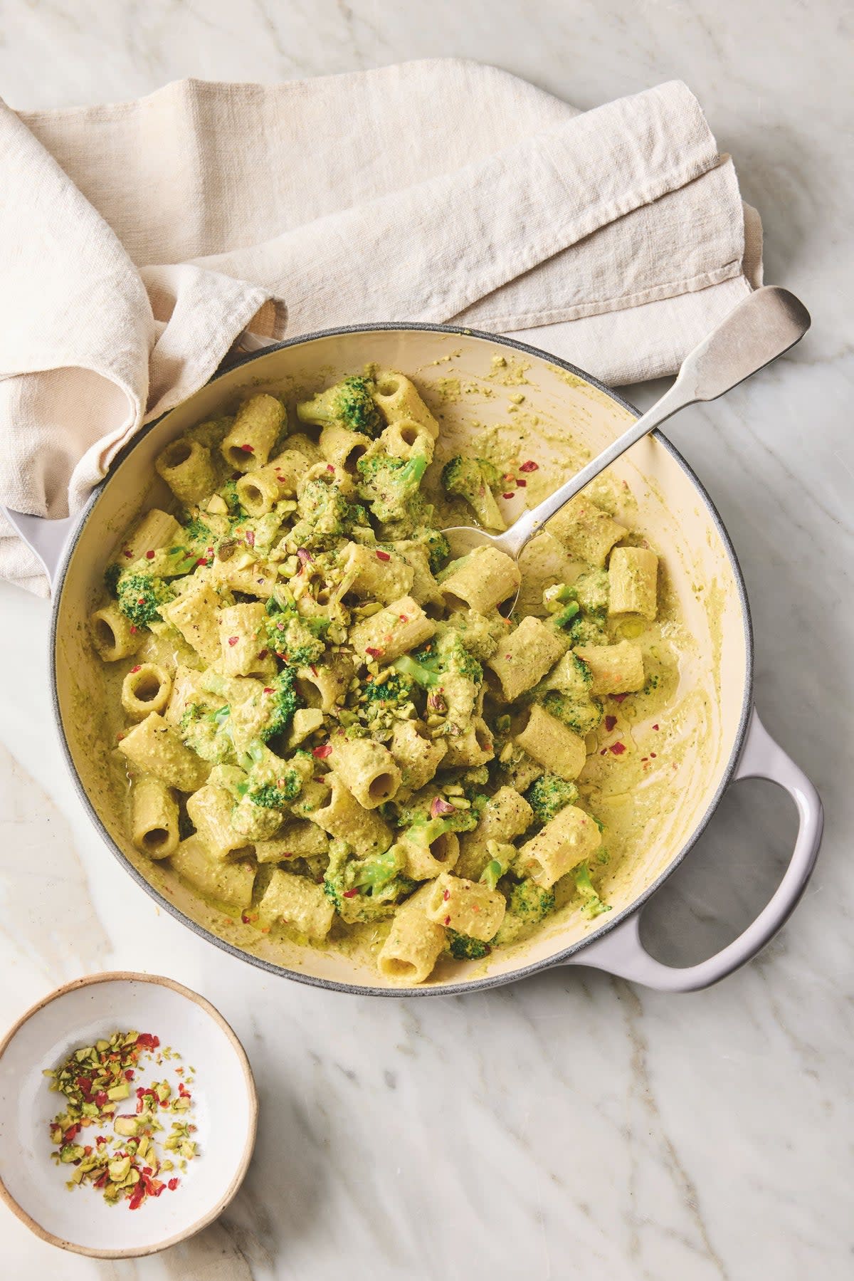 Blended broccoli and pistachios make a bright, creamy pesto that sneaks in extra greens (Clare Winfield)