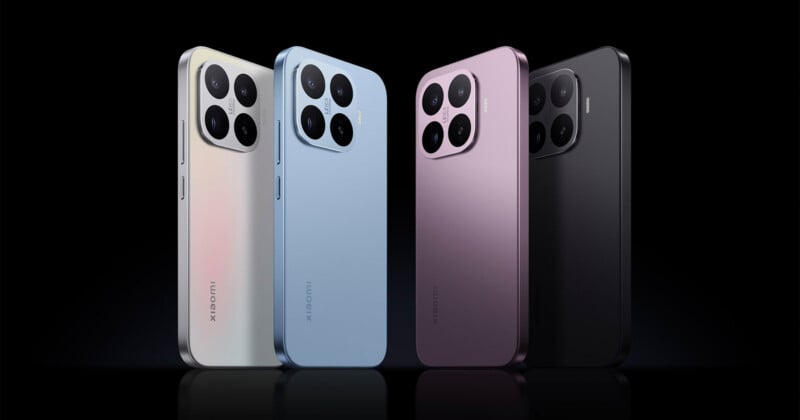 Four Xiaomi smartphones are displayed upright in different colors: white, blue, purple, and black. Each phone features a large square camera module with four lenses on the back, set against a dark background.