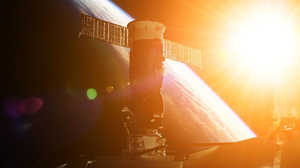 A satellite orbiting Earth.