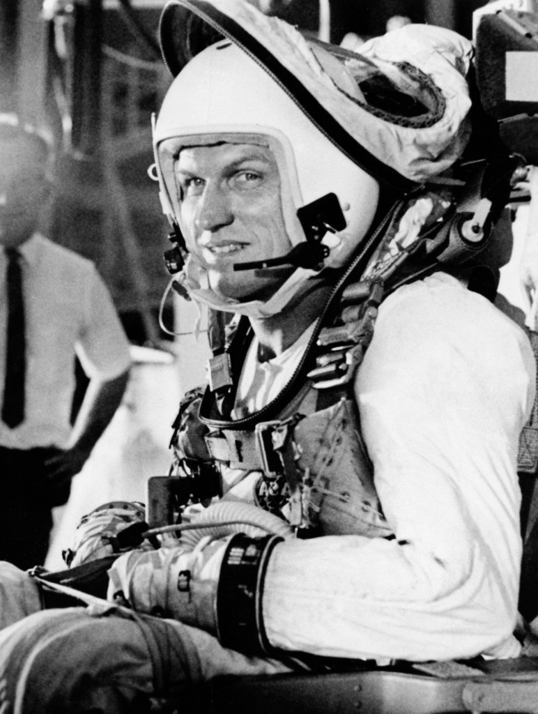 Astronaut Frank Borman in a flight suit and helmet during preparations for the Gemini VII space flight.