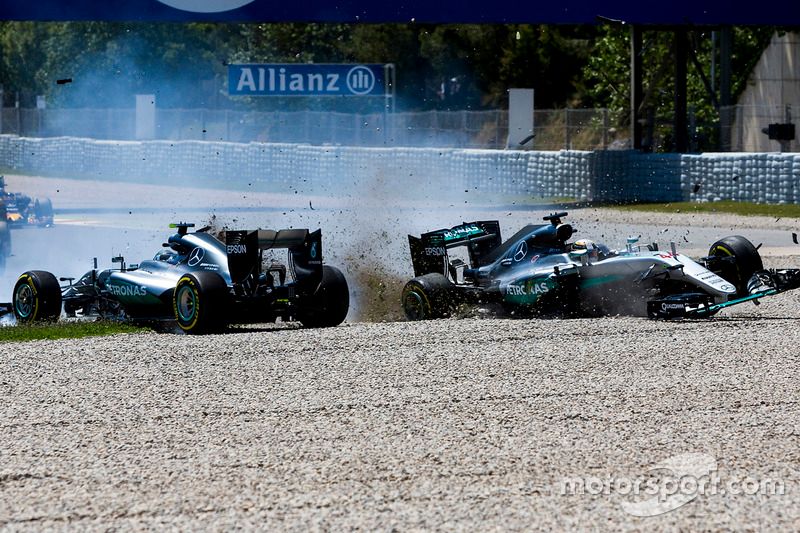 Lewis Hamilton, Mercedes AMG F1 W07 Hybrid and Nico Rosberg, Mercedes AMG F1 W07 Hybrid collide on the opening lap of the race