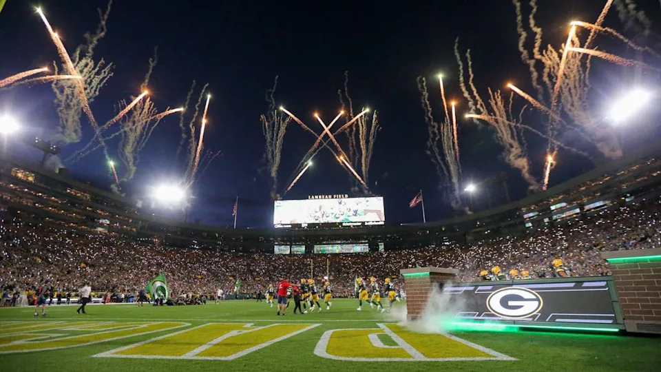 Fireworks are fired off as the Green Bay Packers run out of the tunnel before their football game against the <a class="link " href="https://sports.yahoo.com/nfl/teams/detroit/" data-i13n="sec:content-canvas;subsec:anchor_text;elm:context_link" data-ylk="slk:Detroit Lions;sec:content-canvas;subsec:anchor_text;elm:context_link;itc:0" data-yga="{"yLinkElement":"context_link","yModuleName":"content-canvas","yLinkText":"Detroit Lions","ySubModuleName":"anchor_text","yHasCommerce":false}">Detroit Lions</a> at Lambeau Field in <a class="link " href="https://sports.yahoo.com/nfl/teams/green-bay/" data-i13n="sec:content-canvas;subsec:anchor_text;elm:context_link" data-ylk="slk:Green Bay;sec:content-canvas;subsec:anchor_text;elm:context_link;itc:0" data-yga="{"yLinkElement":"context_link","yModuleName":"content-canvas","yLinkText":"Green Bay","ySubModuleName":"anchor_text","yHasCommerce":false}">Green Bay</a>, Wisconsin.© Tork Mason&sol;USA TODAY NETWORK-Wisconsin &sol; USA TODAY NETWORK via Imagn Images&period;