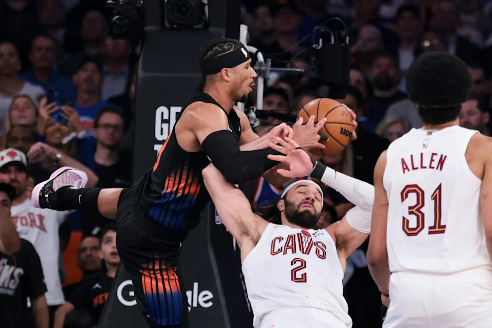 The New York Knicks' Josh Hart and Cleveland Cavaliers' Max Strus get tangled under the basket during Game 2 at Madison Square Garden on May 21, 2026.