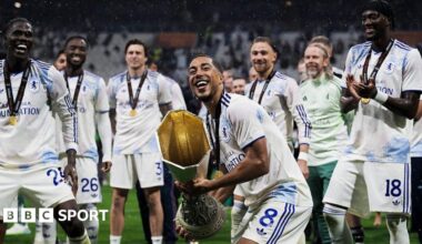 Youri Tielemans of Aston Villa FC lifts the trophy during the award ceremony following the UEFA Europa League final