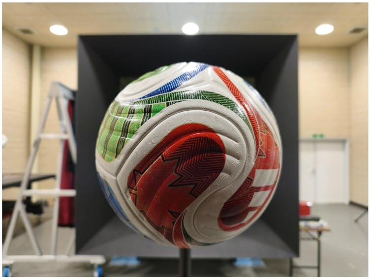 A ball is seen suspended.