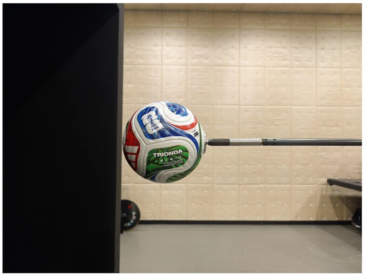 A ball mounted on a rod.