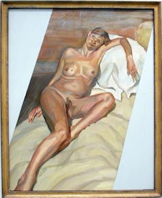 A painting of a young woman reclining naked.