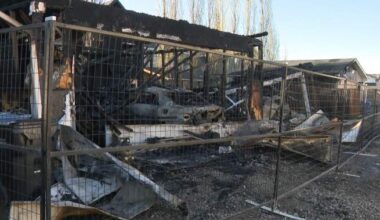 Several garages destroyed, homes damaged by overnight fire in southwest Calgary