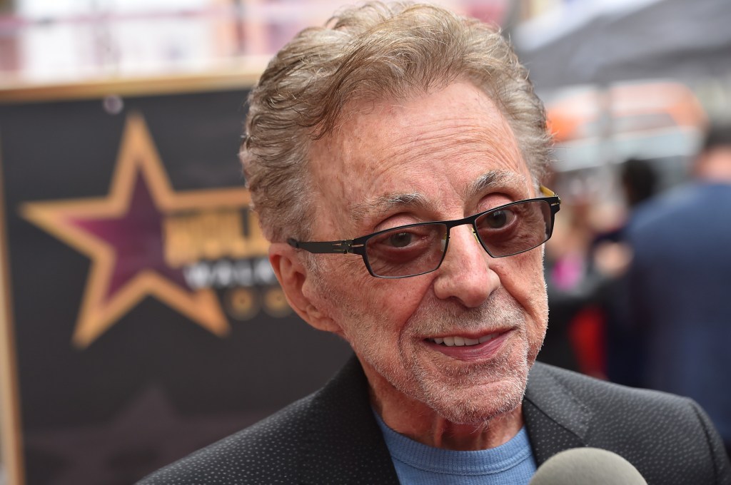 Frankie Valli smiling at his Hollywood Walk of Fame ceremony.