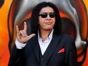 Gene Simmons of Kiss poses before the Revolver Golden Gods Award Show.