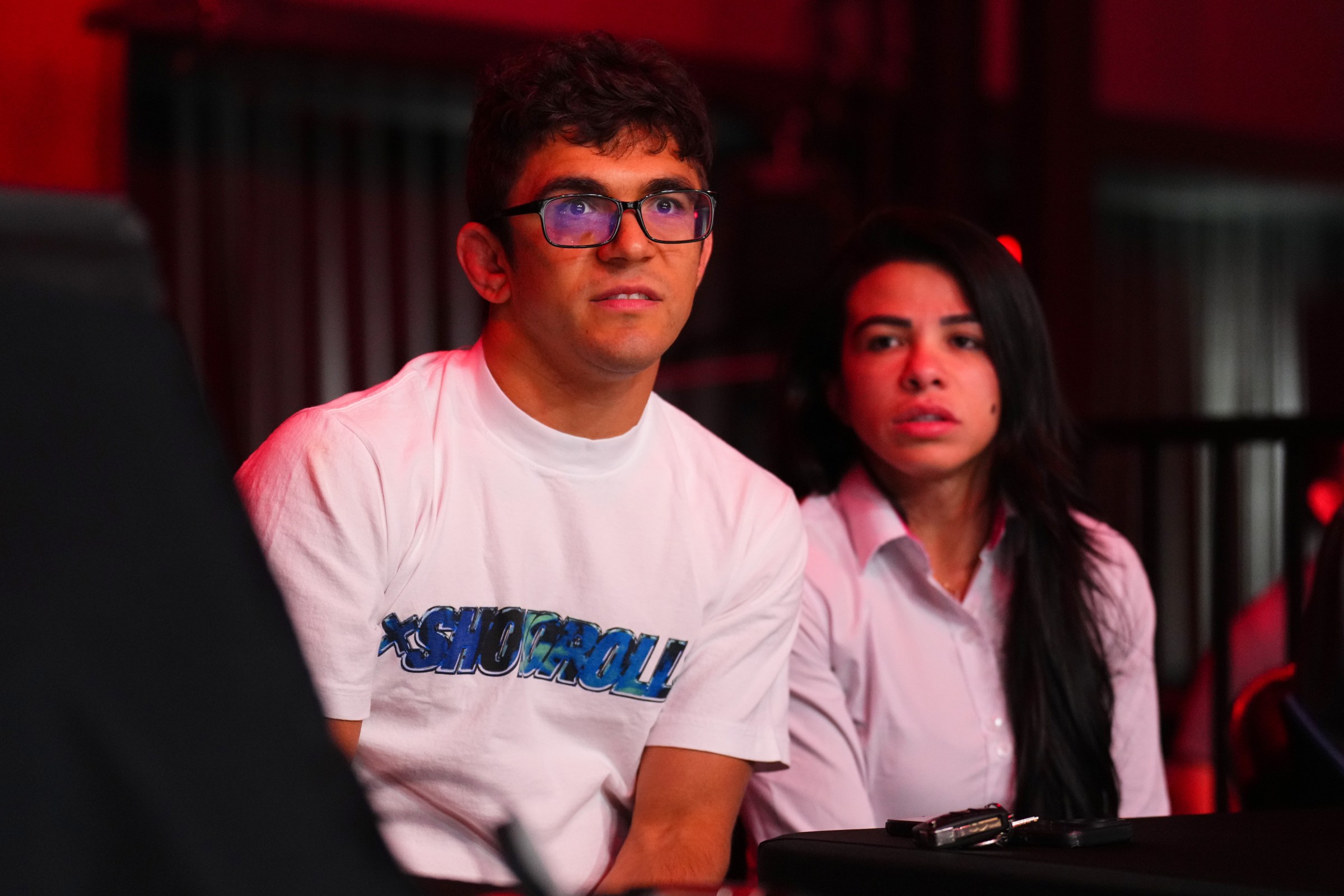 LAS VEGAS, NEVADA - OCTOBER 10: Mikey Musumeci looks on alongside Claudia Gadelha during the UFC Fight Pass Invitational 8 event on October 10, 2024 in Las Vegas, Nevada.