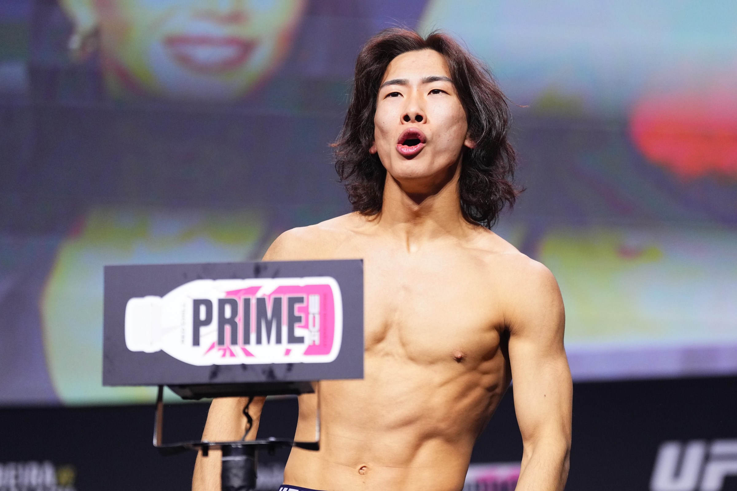 LAS VEGAS, NEVADA - MARCH 07: Rei Tsuruya of Japan poses on the scale during the UFC 313 ceremonial weigh-in at Michelob ULTRA Arena on March 07, 2025 in Las Vegas, Nevada. (Photo by Jeff Bottari/Zuffa LLC)