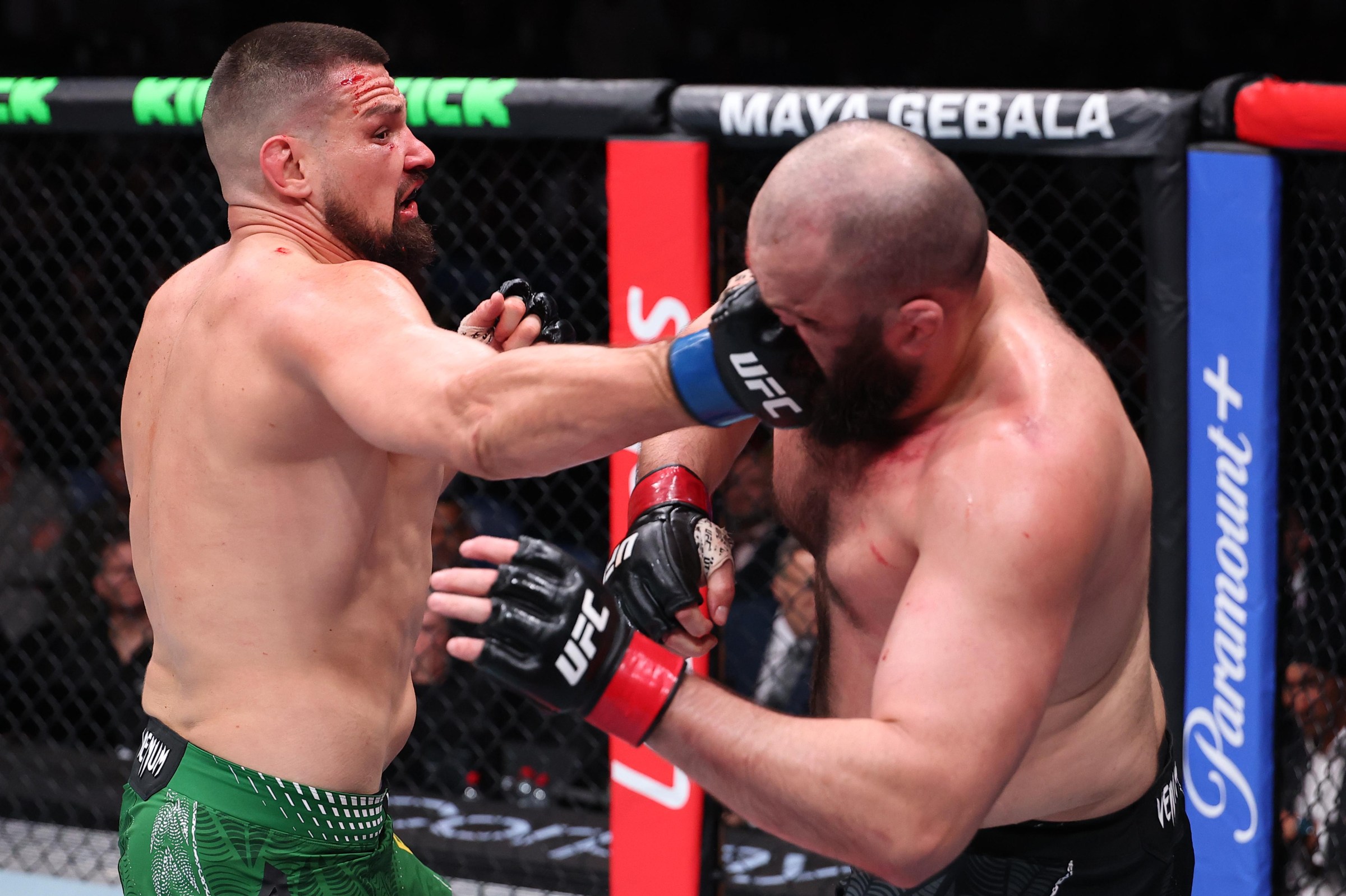 PERTH, AUSTRALIA - MAY 02: (L-R) Brando Pericic of Australia punches Shamil Gaziev of Russia in a heavyweight fight during the UFC Fight Night event at RAC Arena on May 02, 2026 in Perth, Australia. (Photo by Ed Mulholland/Zuffa LLC)