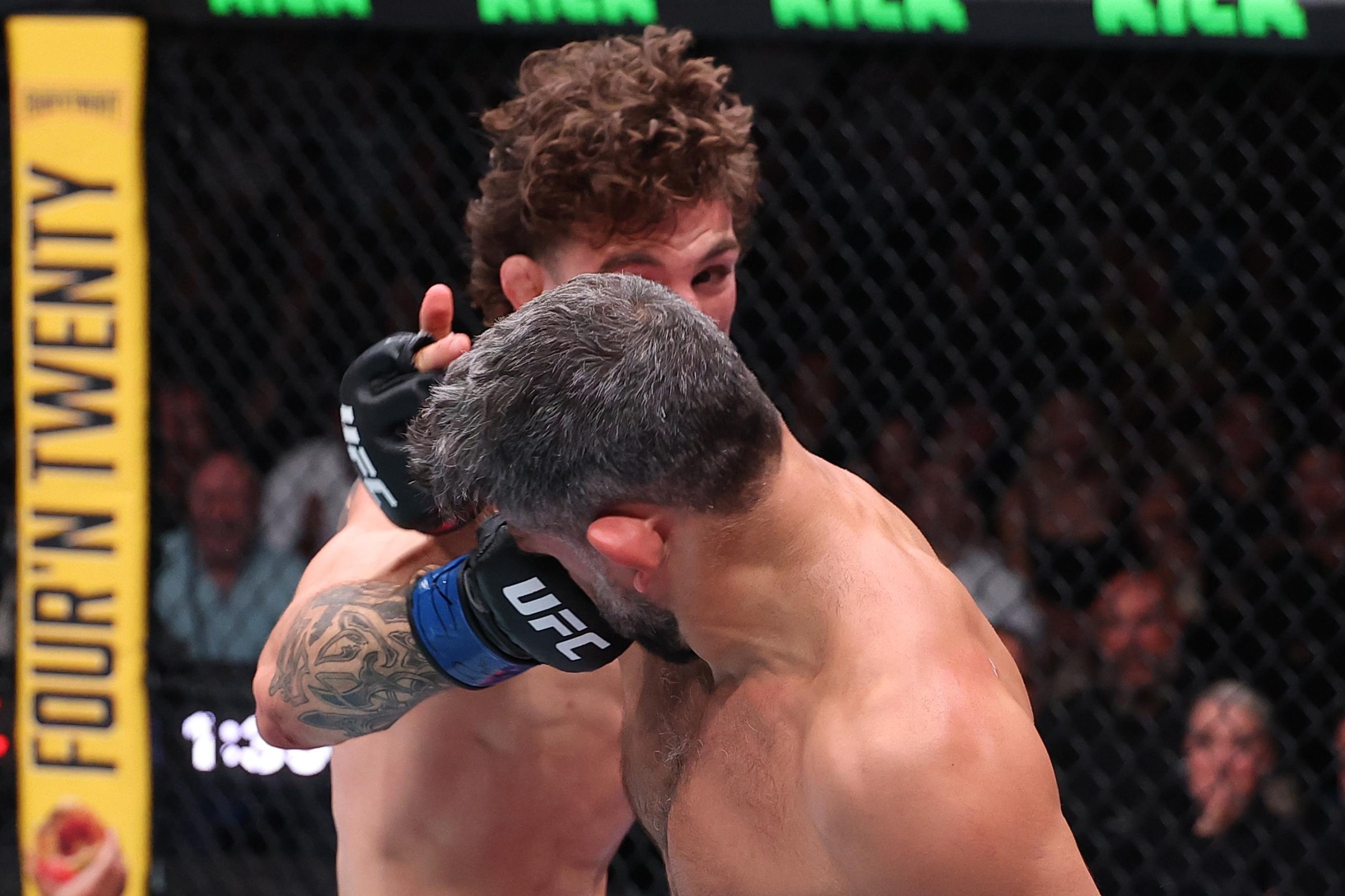 PERTH, AUSTRALIA - MAY 02: (L-R) Quillan Salkilld of Australia punches Beneil Dariush of Iran in a lightweight fight during the UFC Fight Night event at RAC Arena on May 02, 2026 in Perth, Australia. (Photo by Ed Mulholland/Zuffa LLC)