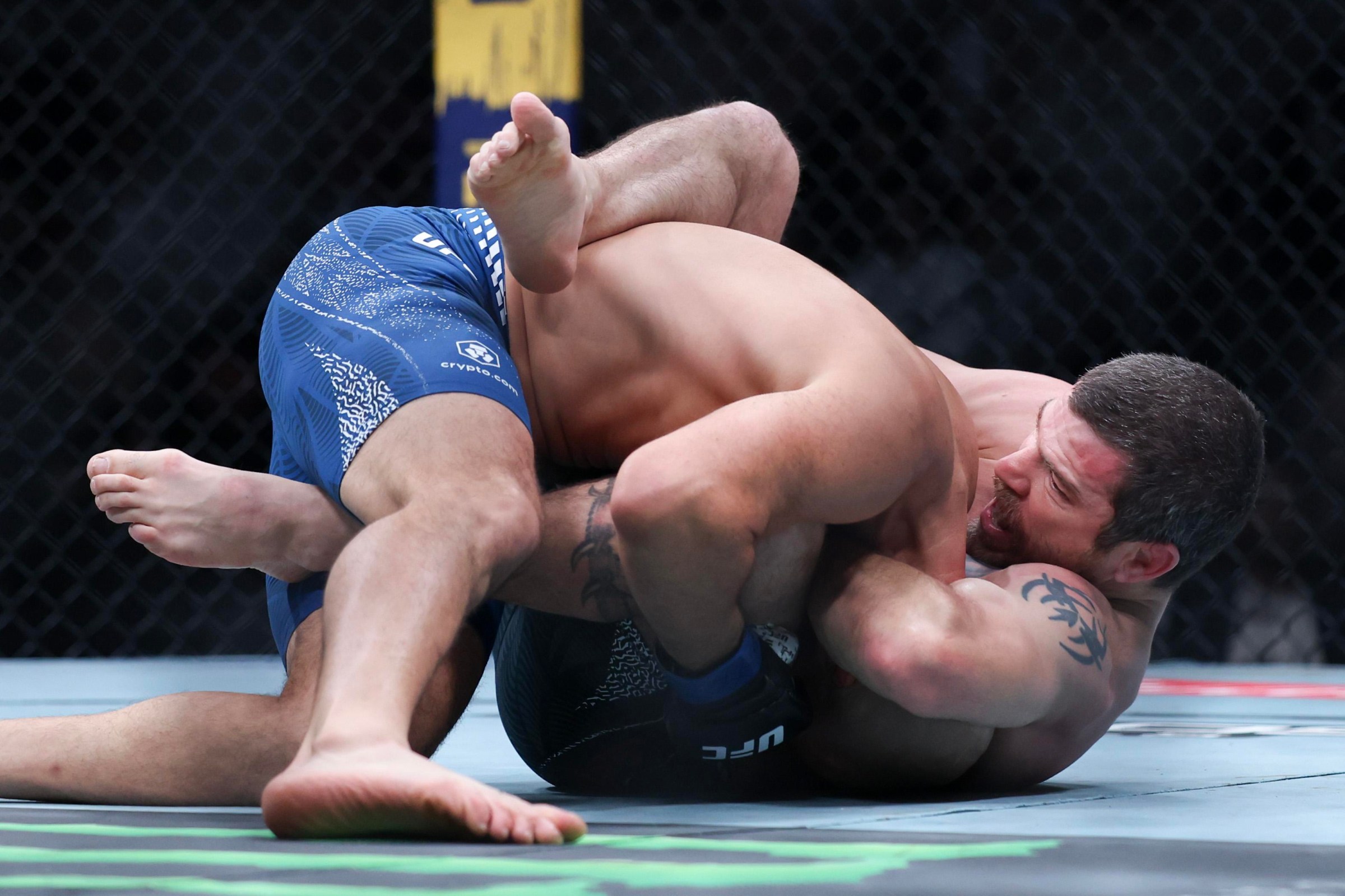 NEWARK, NEW JERSEY - MAY 09: Jim Miller of the United States submits Jared Gordon of the United States in a lightweight fight during UFC 328 at the Prudential Center on May 09, 2026 in Newark, New Jersey. (Photo by Ishika Samant/Getty Images)