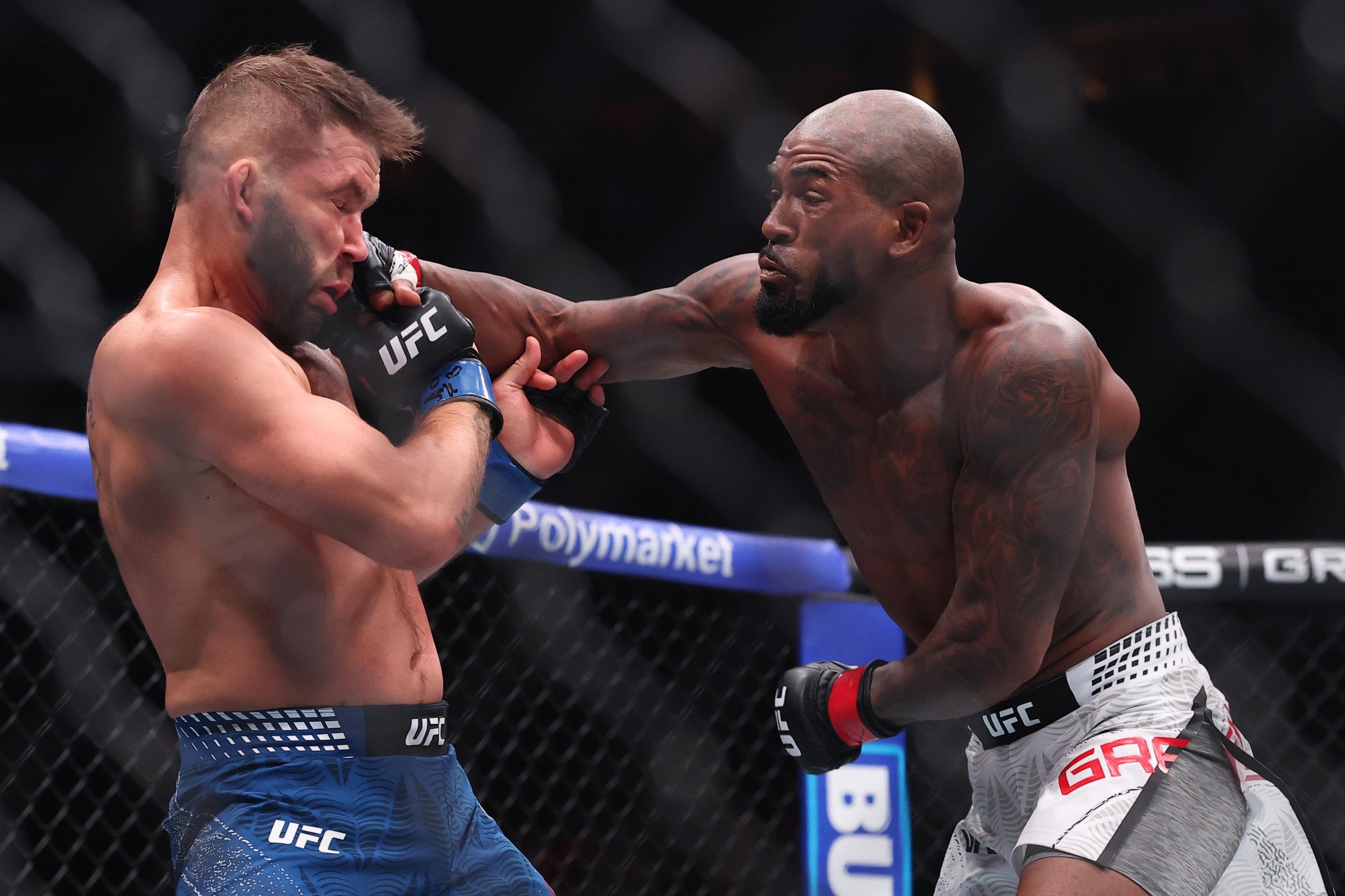 NEWARK, NEW JERSEY - MAY 09: King Green punches Jeremy Stephens in a lightweight fight during the UFC 328 event at Prudential Center on May 09, 2026 in Newark, New Jersey. (Photo by Ed Mulholland/Zuffa LLC)