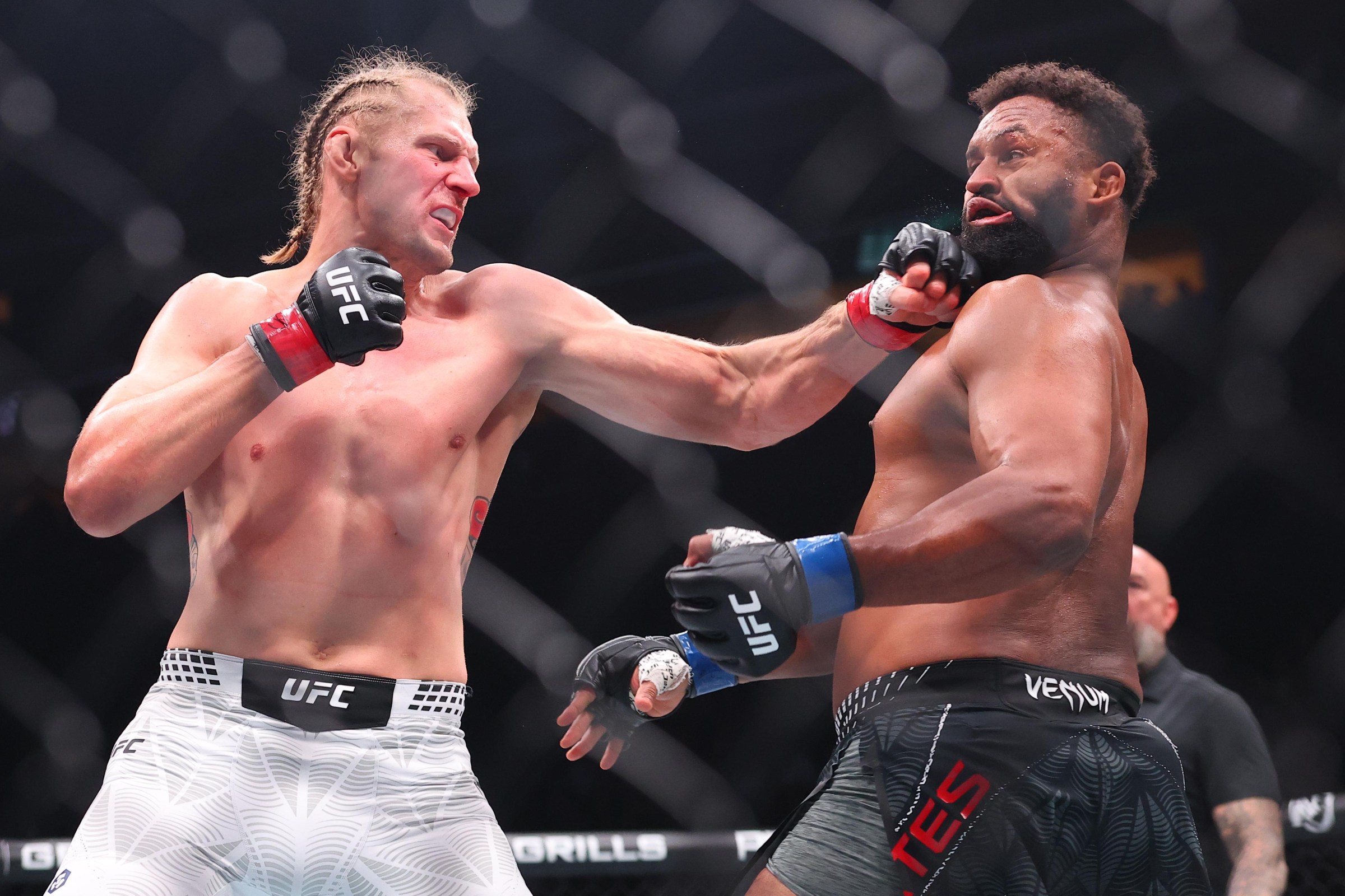 NEWARK, NEW JERSEY - MAY 09: (L-R) Alexander Volkov of Russia punches Waldo Cortes Acosta of the Dominican Republic in a heavyweight fight during the UFC 328 event at Prudential Center on May 09, 2026 in Newark, New Jersey. (Photo by Ed Mulholland/Zuffa LLC)