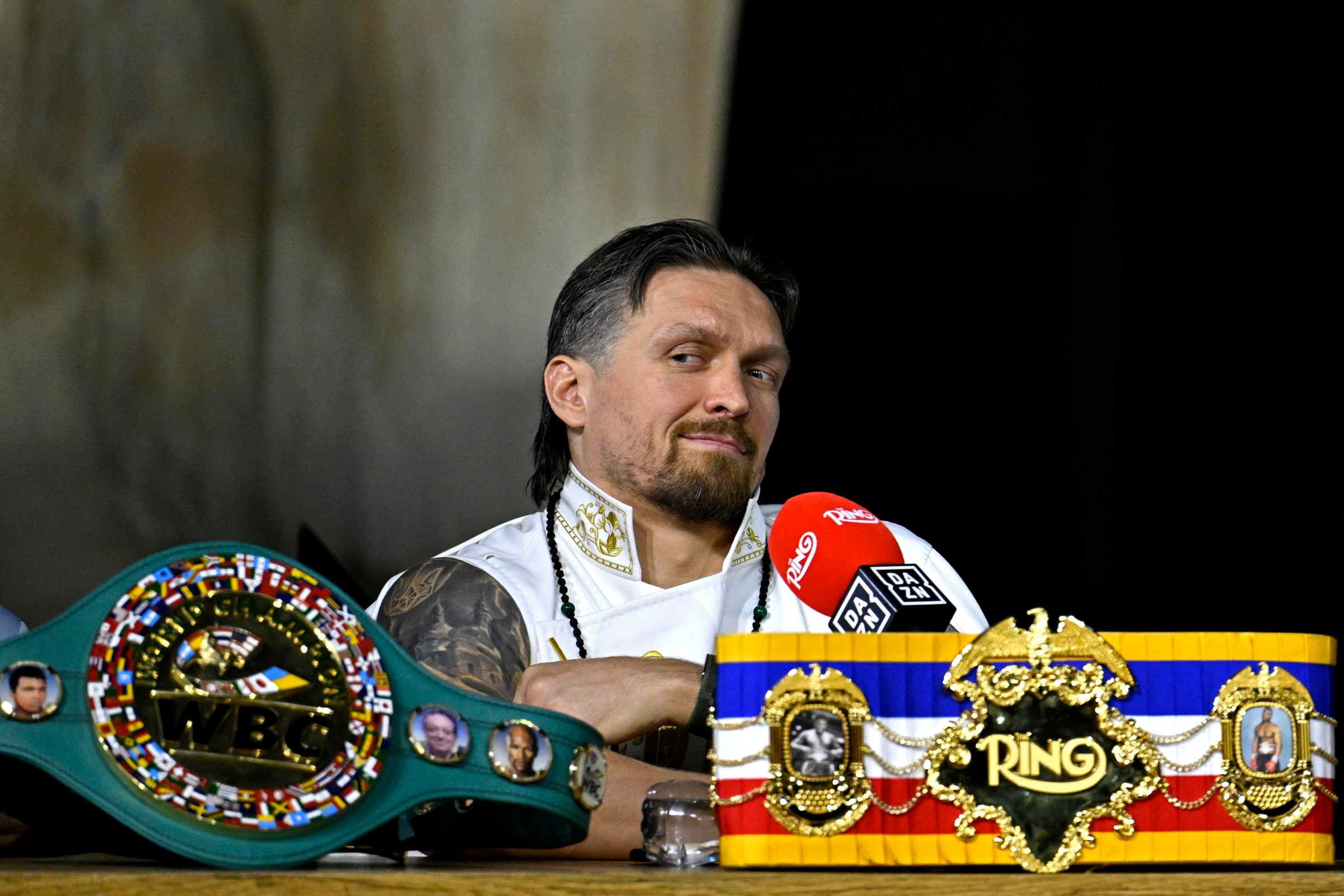 Ukraine’s Oleksandr Usyk attends a press conference at the Grand Egyptian Museum in Giza on May 21, 2026, ahead of his WBC World Heavyweight Championship ‘Glory in Giza’ boxing match against Netherlands’ Rico Verhoeven in Egypt. (Photo by Khaled DESOUKI / AFP via Getty Images)