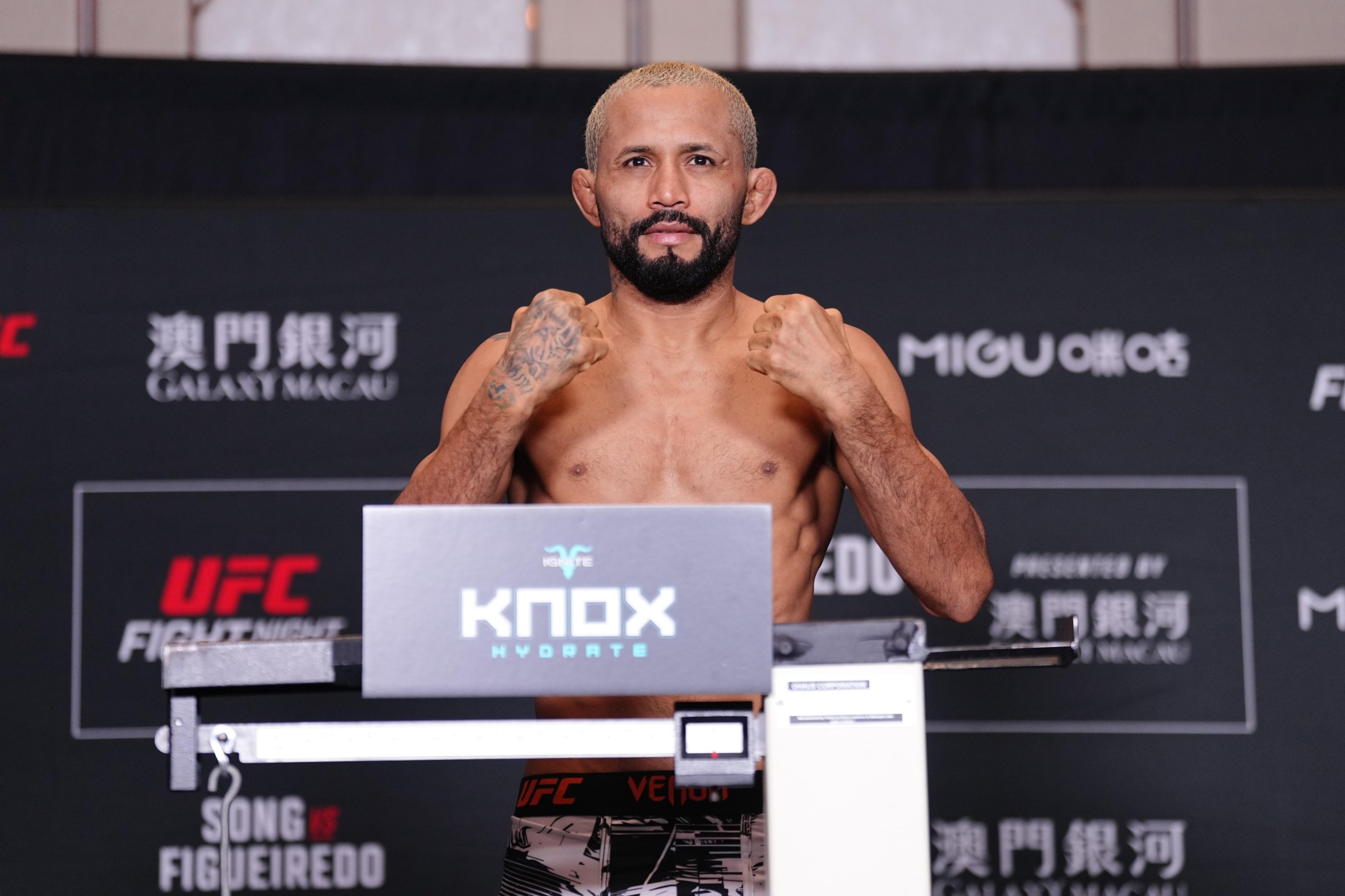 MACAU, CHINA - MAY 29: Deiveson Figueiredo of Brazil poses on the scale during the UFC Fight Night official weigh-ins at Galaxy International Convention Center on May 29, 2026 in Macau, China. (Photo by Jeff Bottari/Zuffa LLC)