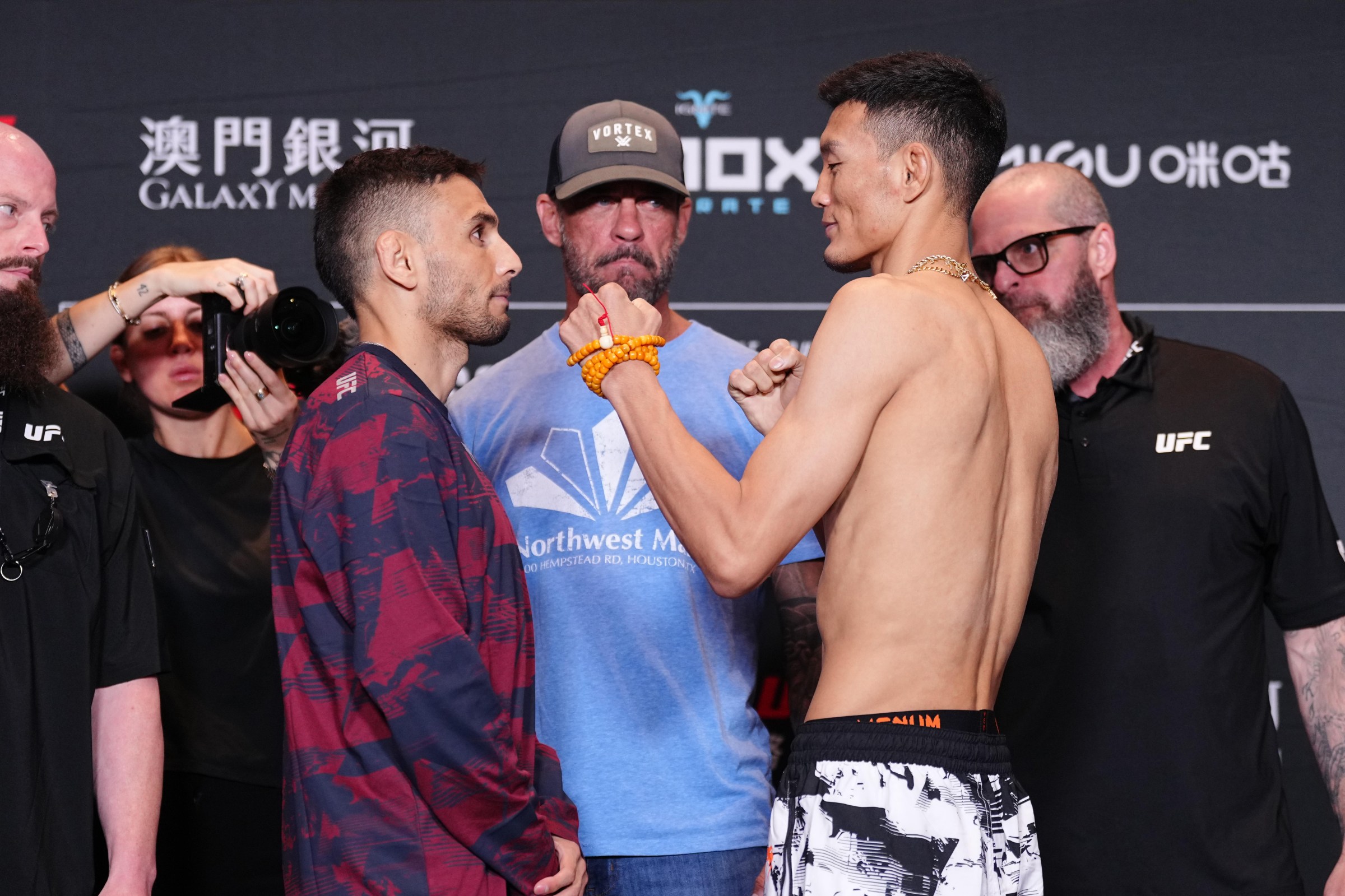 MACAU, CHINA - MAY 29: (L-R) Alex Perez and Sumudaerji of China face off during the UFC Fight Night official weigh-ins at Galaxy International Convention Center on May 29, 2026 in Macau, China. (Photo by Jeff Bottari/Zuffa LLC)