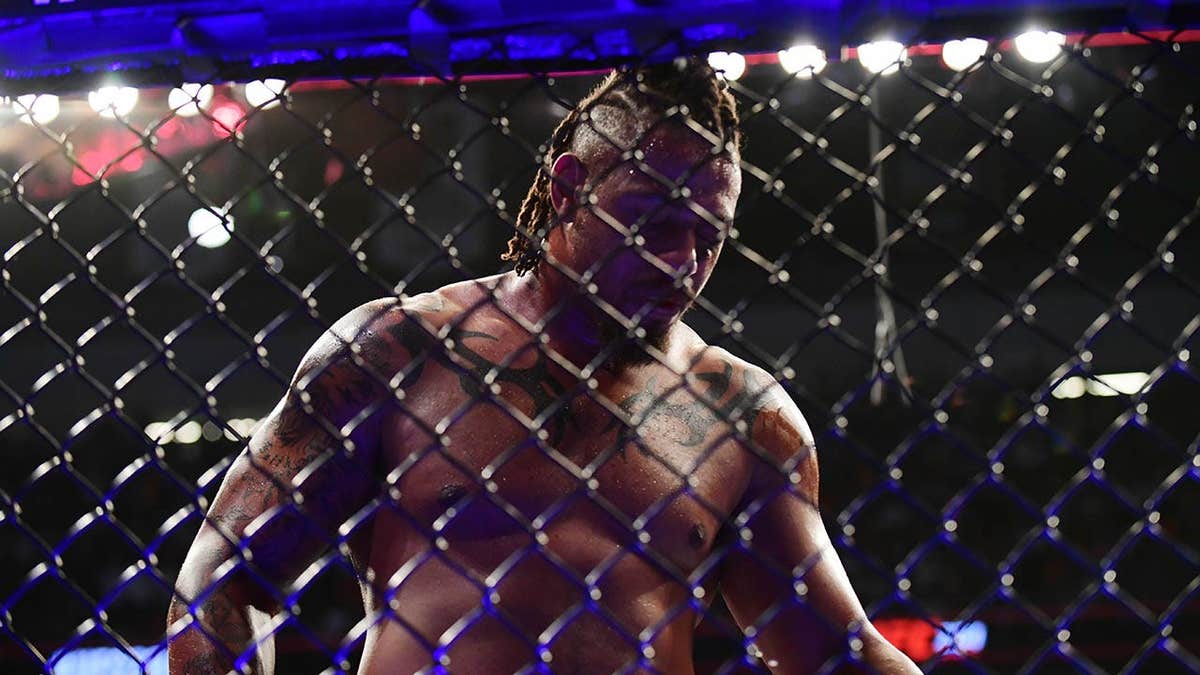 Greg Hardy walking in octagon after loss at UFC 264 in Las Vegas