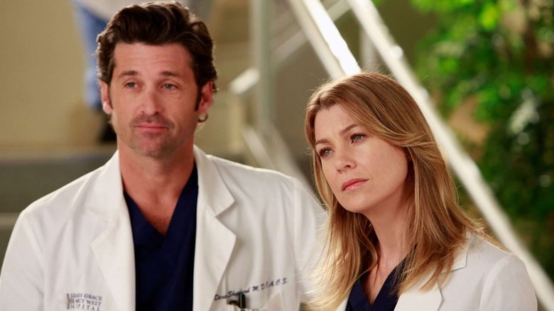 Derek Shepherd and Meredith Grey looking on