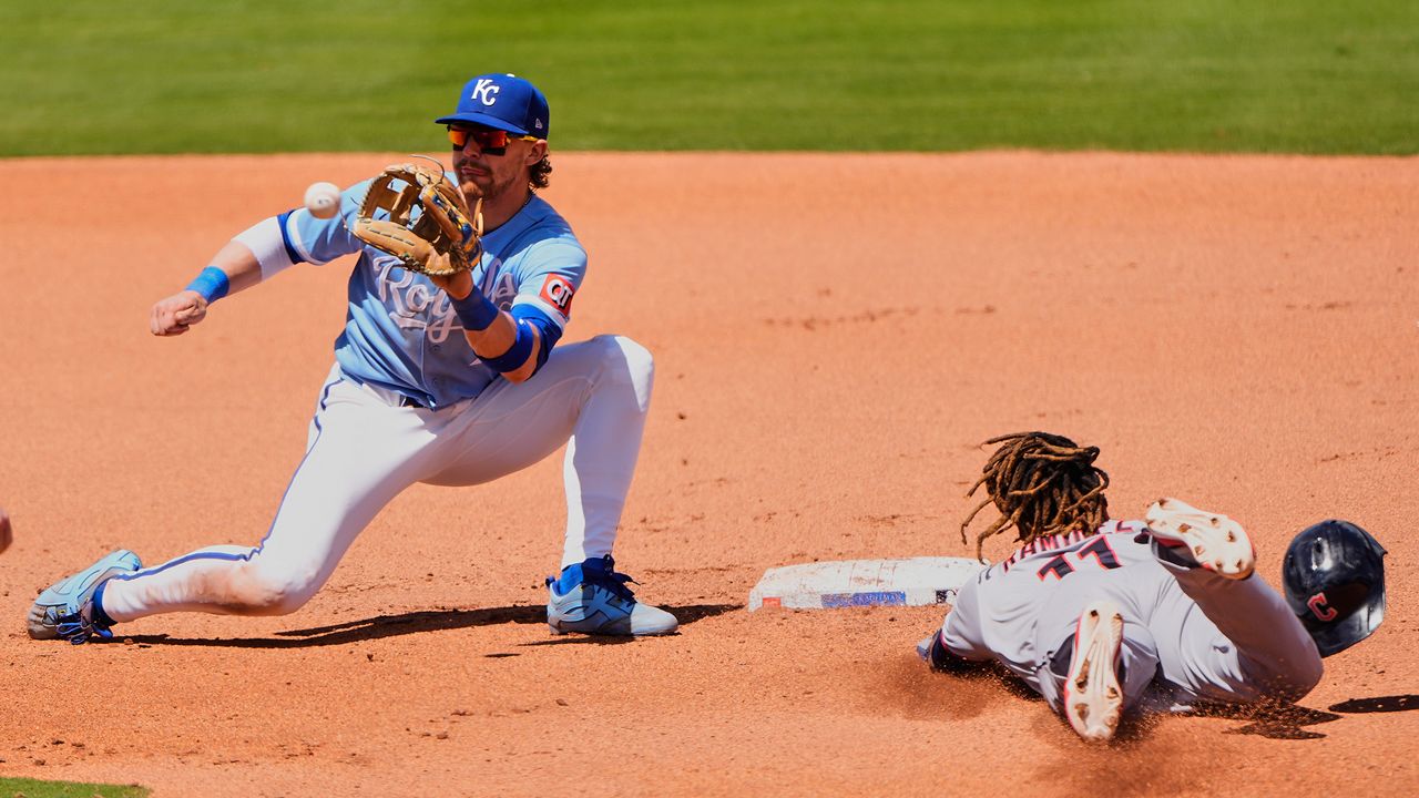 Cleveland Guardians' Jose Ramirez (11) is caught stealing second by Kansas City Royals shortstop Bobby Witt Jr. during the fourth inning of a baseball game Thursday, May 7, 2026, in Kansas City, Mo. (AP Photo/Charlie Riedel)