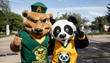 U of A Golden Bears and Panda mascots Guba and Patches.