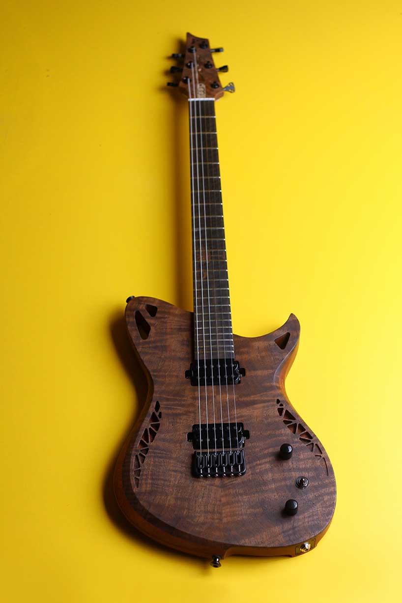 natural geometrics and organic variation inform omer deutsch's handcrafted guitars - 3