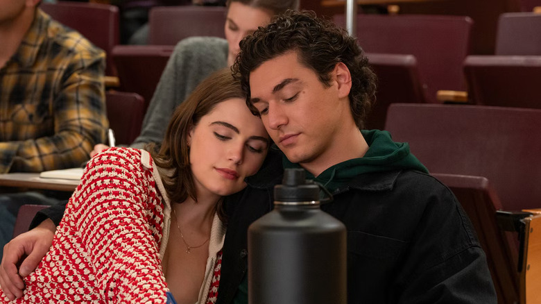 Hannah and Garrett cuddling in class in Off Campus