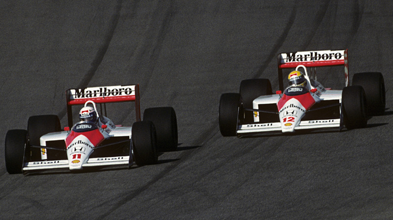 Alain Prost, Ayrton Senna, Grand Prix of Portugal, Estoril, 25 September 1988. (Photo by Paul-Henri Cahier/Getty Images)