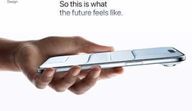 Hand holding a sleek, reflective smartphone horizontally against a white background, symbolizing future design.