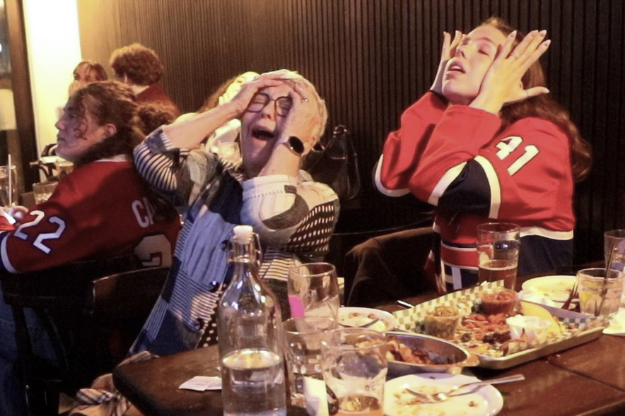 Canadiens fans react with horror when watching a game at a bar. 