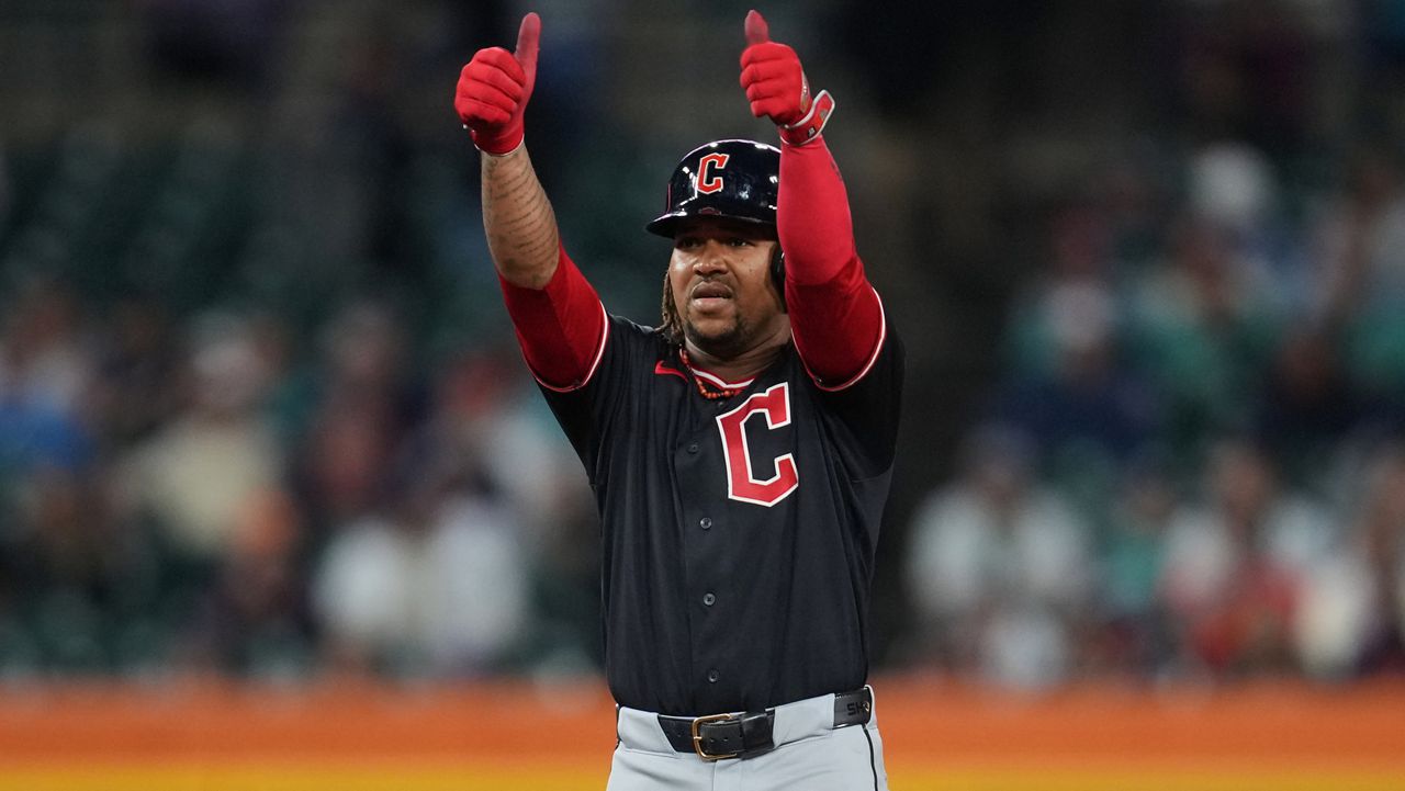 Cleveland Guardians' José Ramírez reacts to his one-run double against the Detroit Tigers during the 10th inning of a baseball game Wednesday, May 20, 2026, in Detroit. (AP Photo/Paul Sancya)
