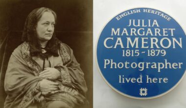 A sepia portrait of a seated woman in Victorian attire is beside a blue English Heritage plaque reading: “Julia Margaret Cameron 1815–1879 Photographer lived here.”.