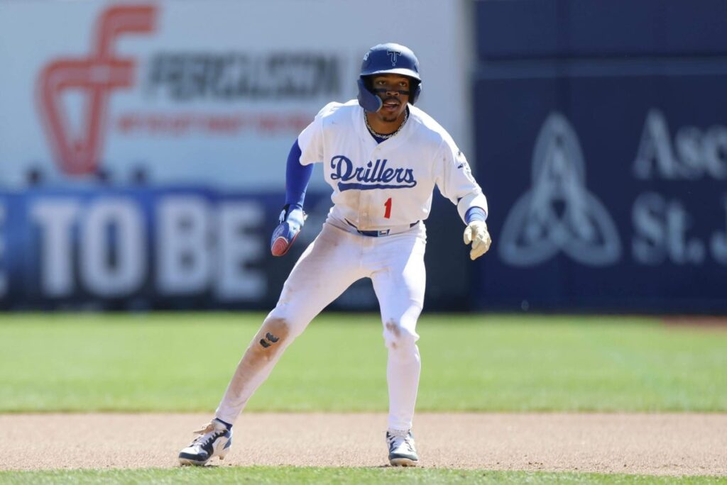 Kendall George of the Tulsa Drillers takes a lead off first base during a game against the Arkansas Travelers in Tulsa, Oklahoma, on April 19, 2026, in Tulsa, Oklahoma
